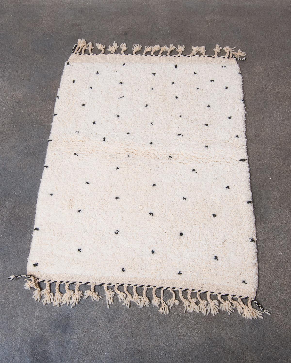 Modern, designer, handcrafted Berber rug from Morocco. Beniourain carpet with beautiful colours and patterns and fluffy wool texture.